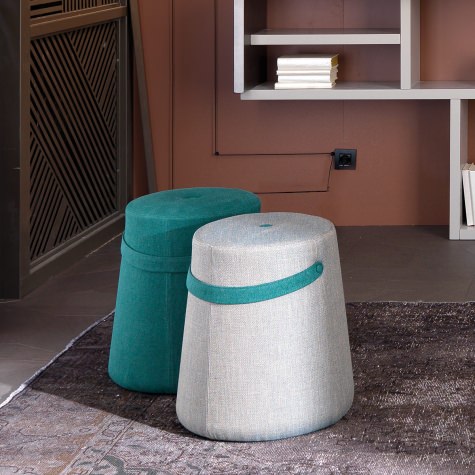 Upholstered pouf with circular base