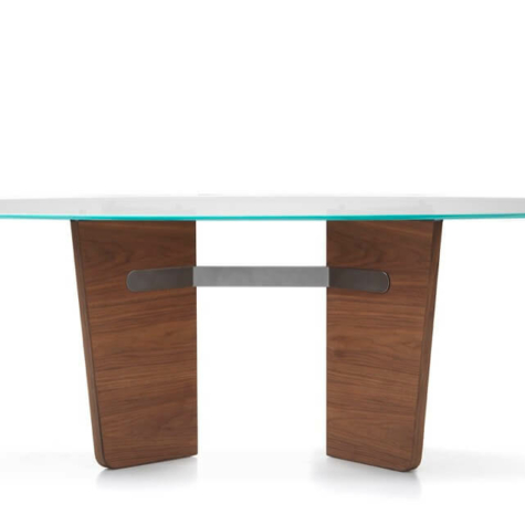 Oval table in extra-clear bevelled glass with legs in American Walnut wood