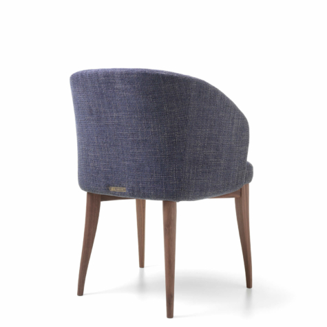 Upholstered armchair in solid wood